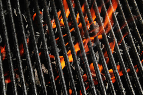 Photo of Fire Seeping Through Grill Grates