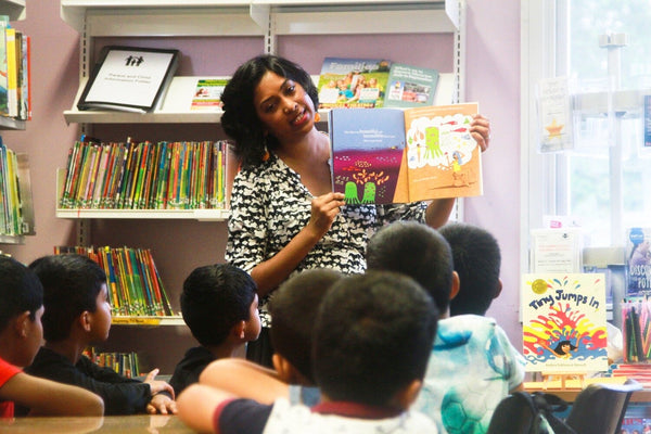 Inshra reading tiny jumps in to kids
