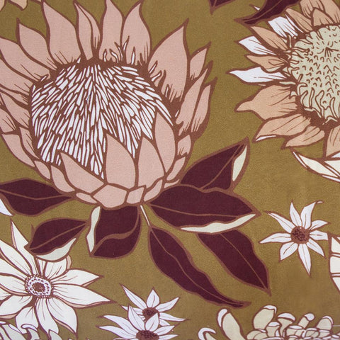 Printed floral quilt cover design by Bambury called Araluen, on an ochre background and featuring proteas 