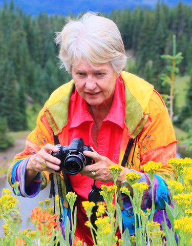 Linda Nagy photographing Blacktip Senecio and Red Paintbrush