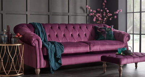 Purple velvet sofa