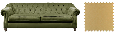 Olive green velvet sofa with gold tones