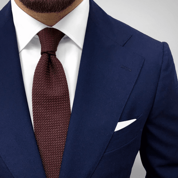 Brown Grenadine Tie With A Navy Suit