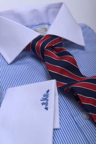 University Striped Tie against Narrow Striped Shirt