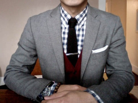 burgundy cardigan with a black knitted tie