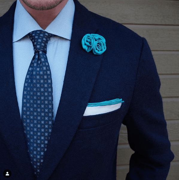 navy blue suit with light blue shirt