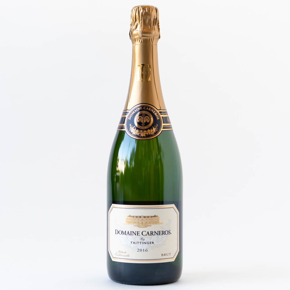 A bottle of Domaine Carneros's brut sparkling wine against a white background
