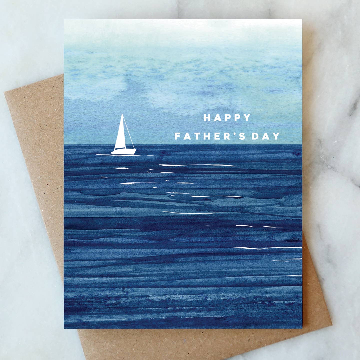 Happy Father's Day card with a sailboat on water image