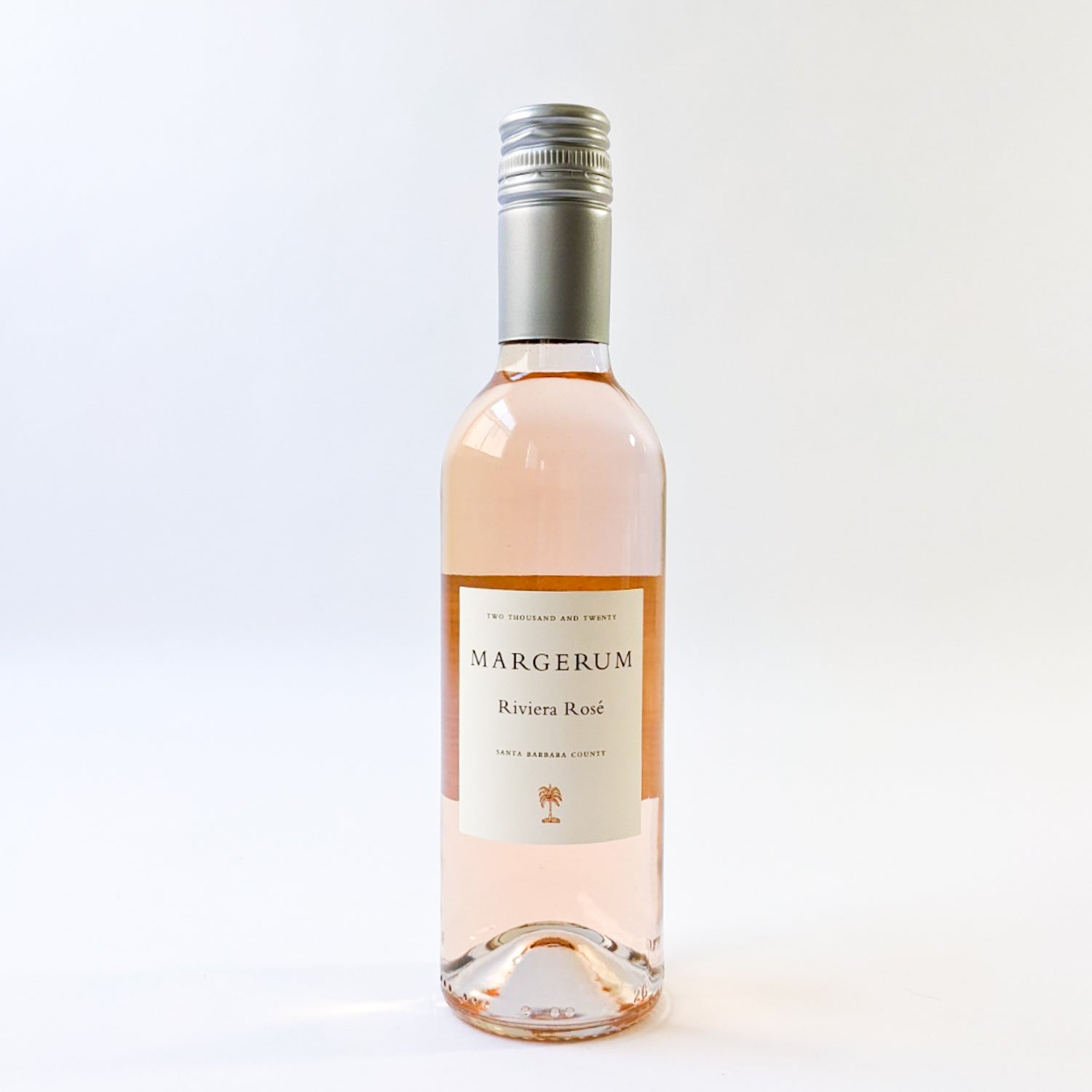 Small bottle of Margerum's Riviera Rosé against a white background