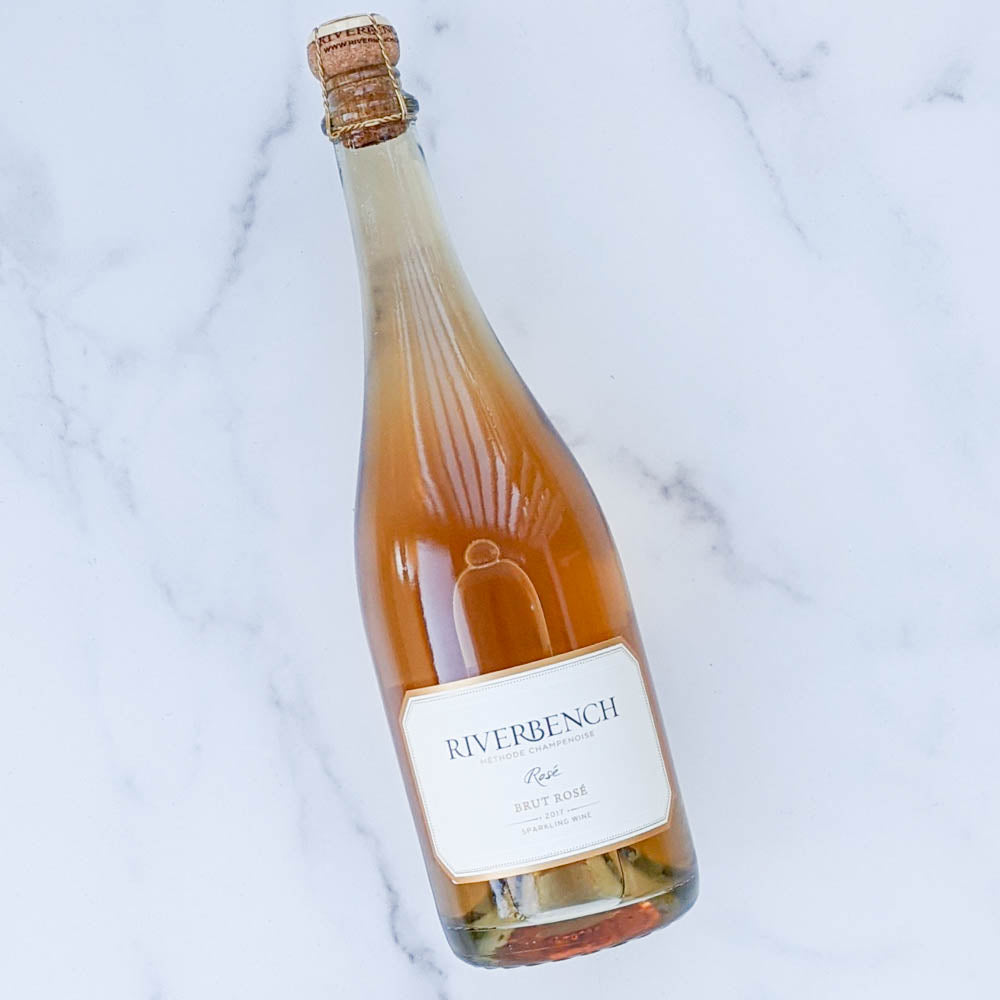 Riverbench Rosé wine against a marble background