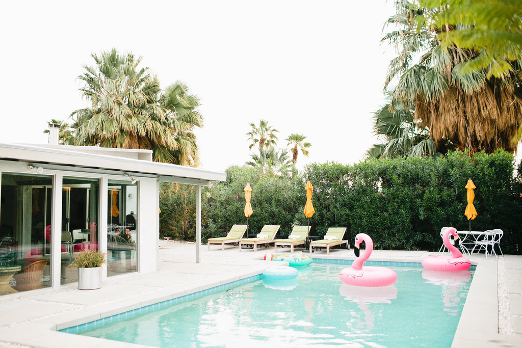 Pink Flamingos in Palm Springs Pool