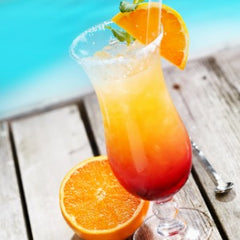 sexy summer cocktail sex on the beach by pool 