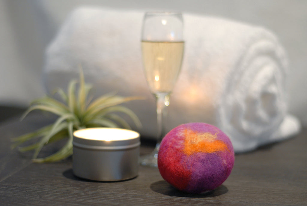Felted soap with candle, champagne, and towel