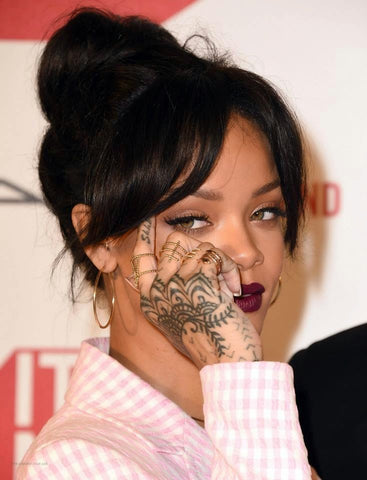 Rihanna in Lady Grey jewelry rings by Jill Martinelli and Sabine Le Guyader