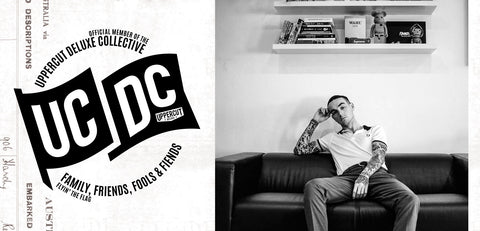 Todd Page next to UCDC logo