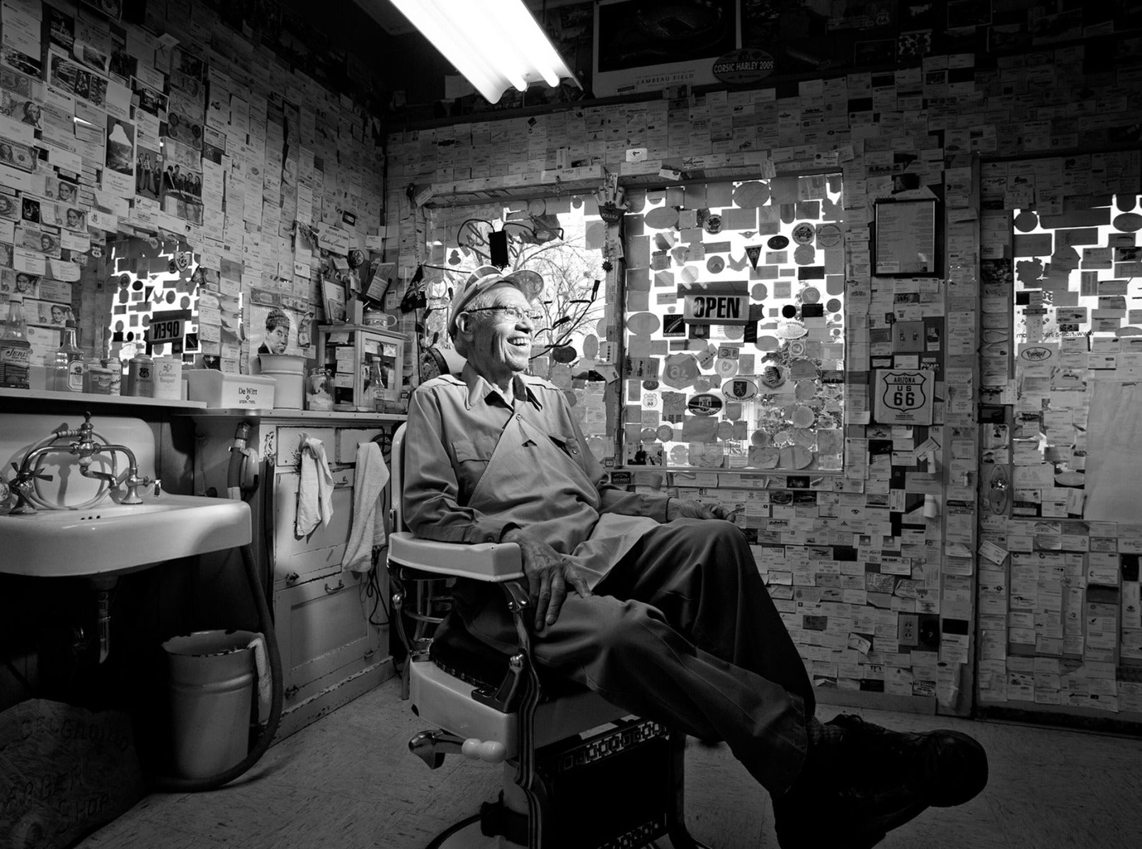 Man smiling in barber chair