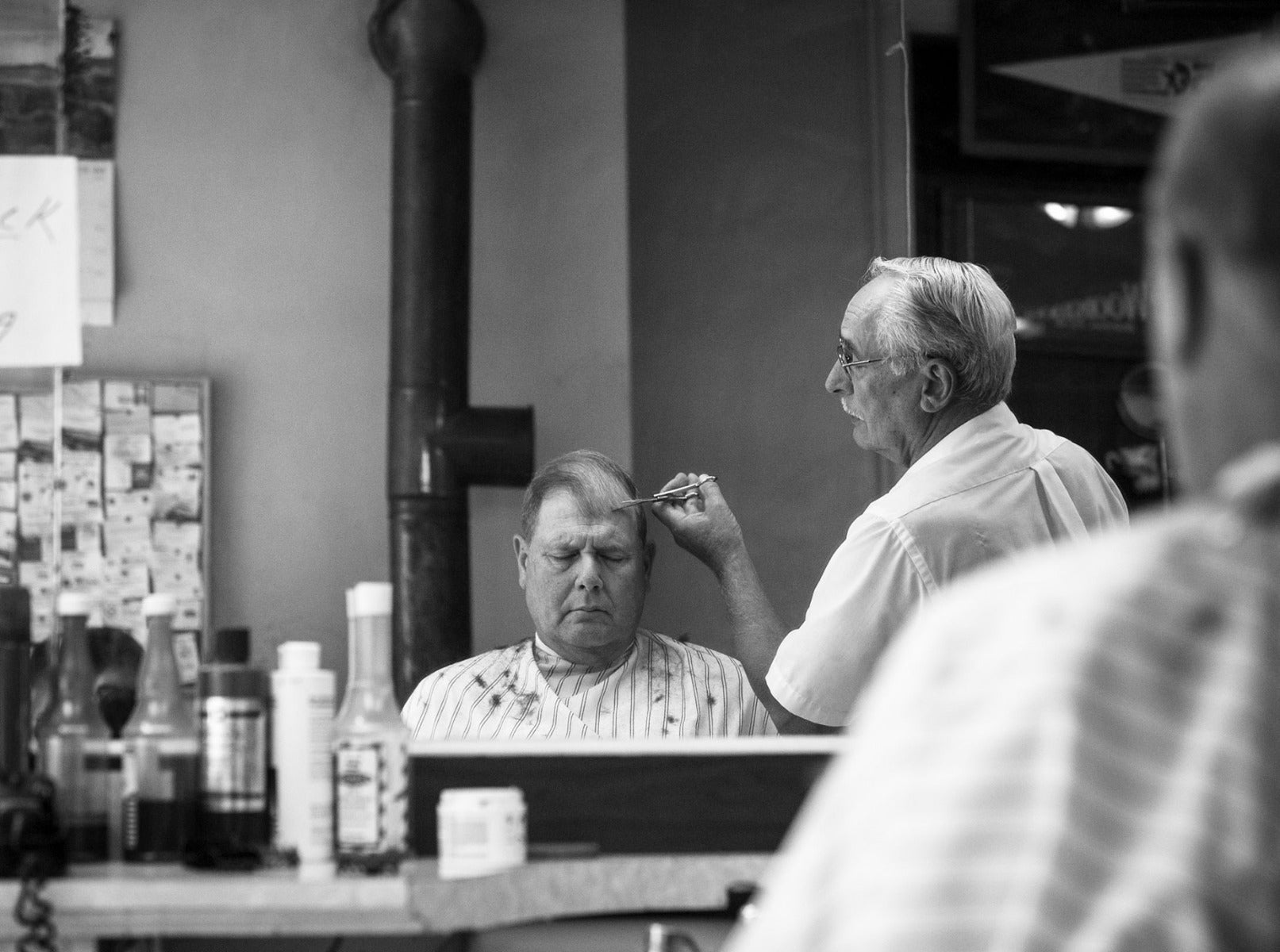 Man getting a haircut in a barbershop