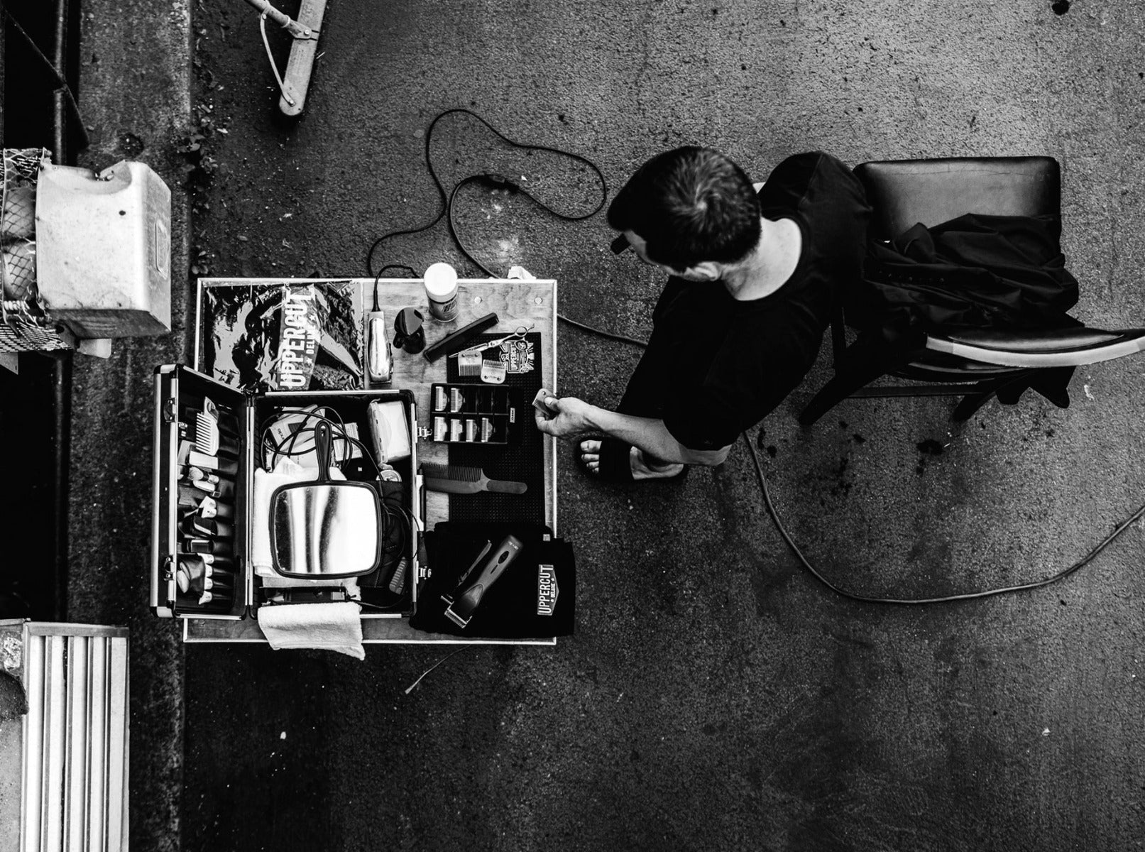 Top down view of a barber and his tools