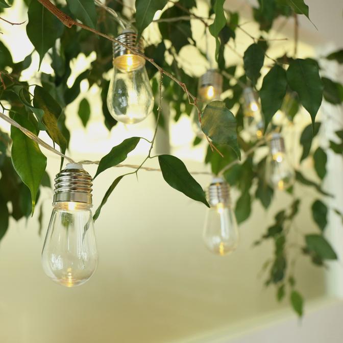 hanging light fixture over dining room table