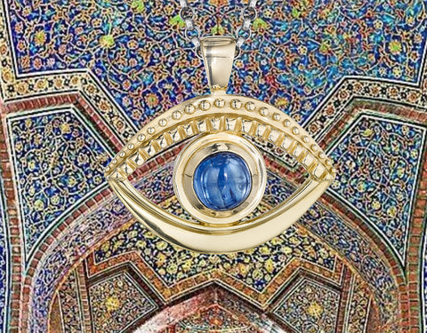 14k gold evil eye necklace over a fabulous mosaic inside of a mosque