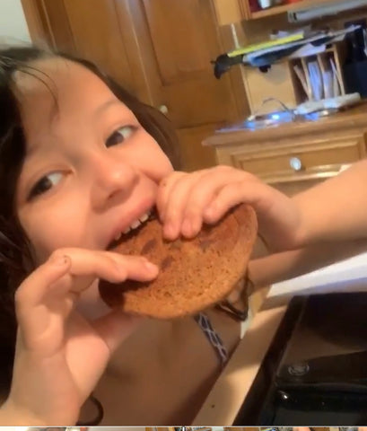 Evelyn eating cookie