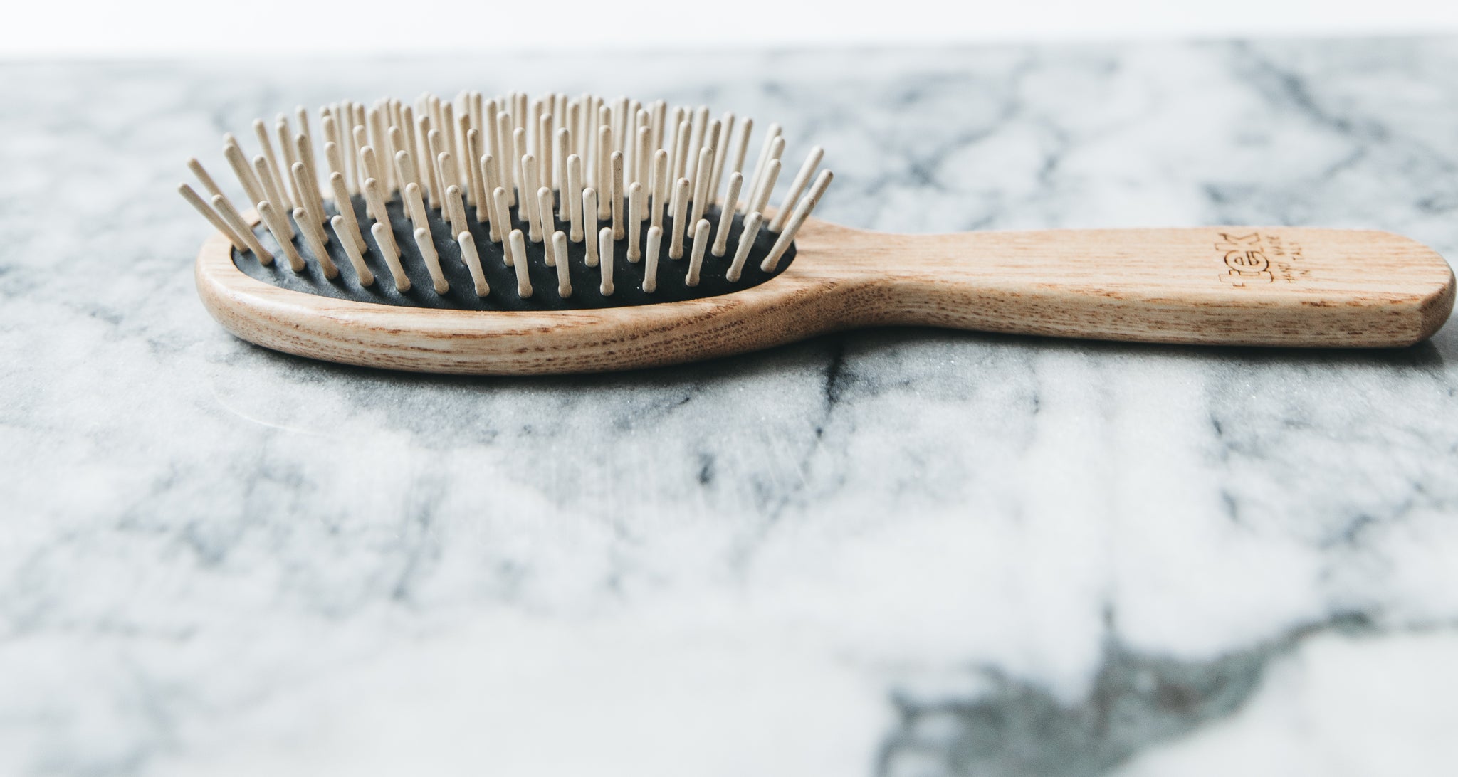 clean wooden hair brush