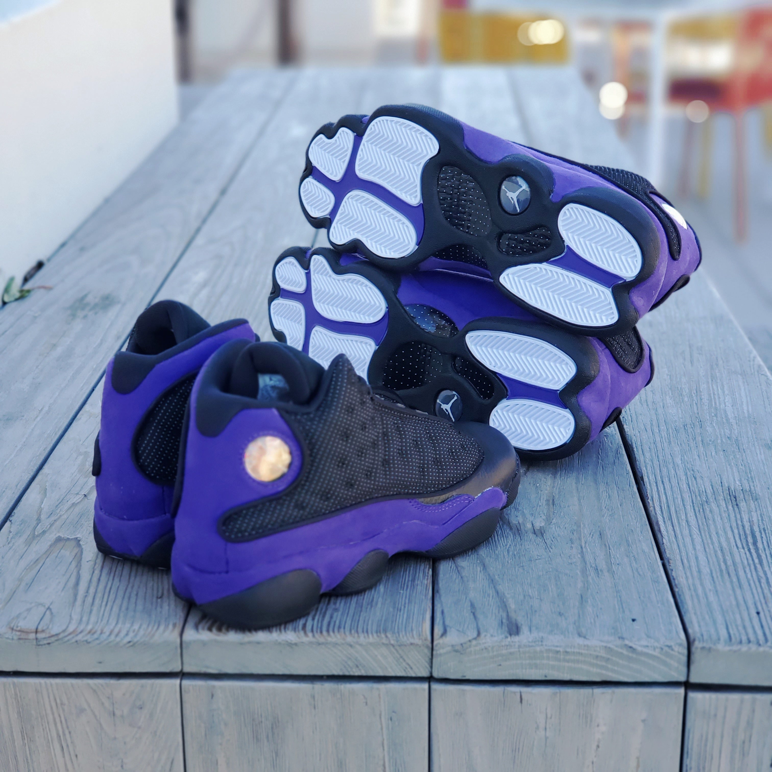 purple and black jordan 13