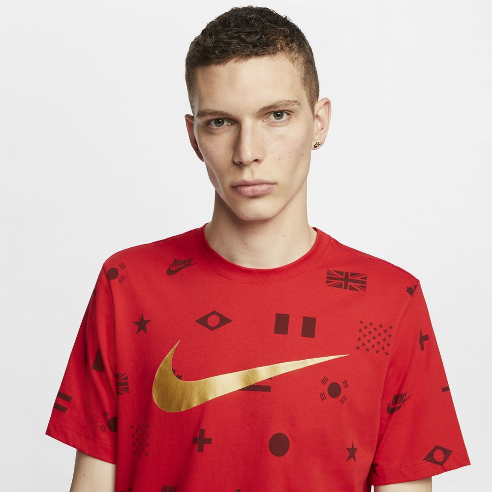 red and gold nike shirt