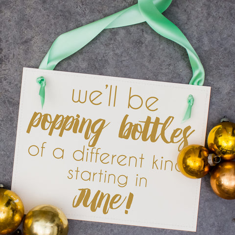 We'll Be Popping Bottles of A Different Kind Sign Baby Announcement