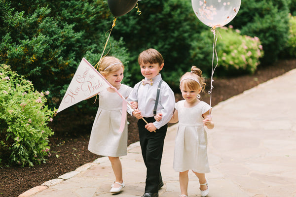 Balloon Ring Bearer Ritzy Rose Sign | Photo by Rachel Moore