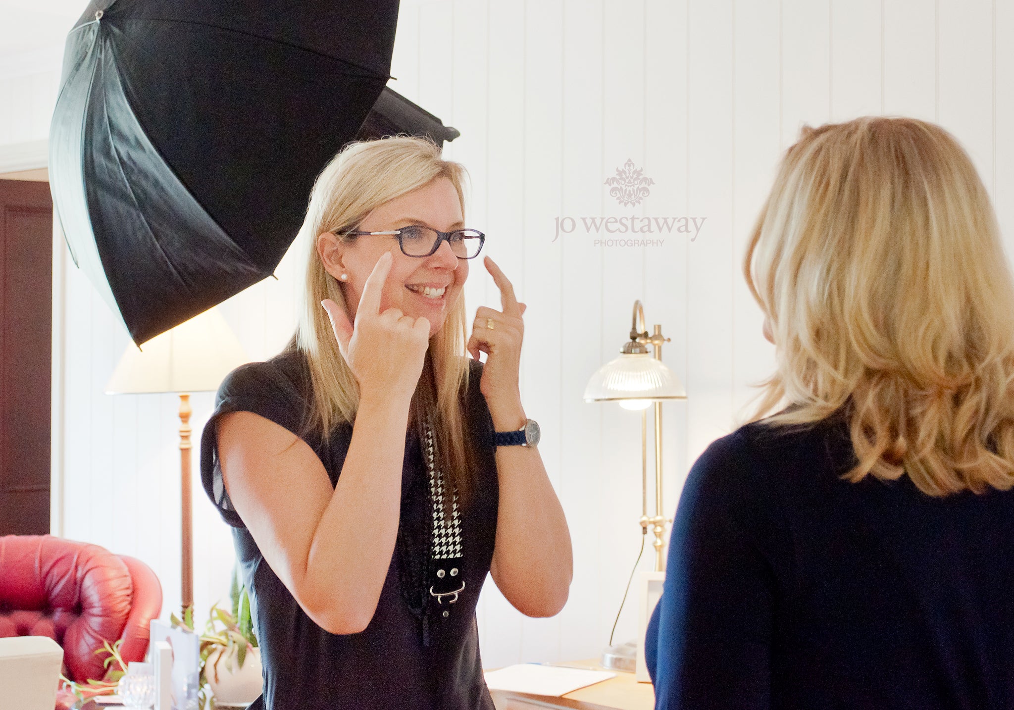 How to get a natural flattering smile in photos - professional brand photography shows her clients