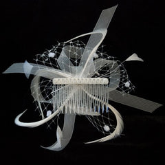 Cream Looped Ribbon and Net with Feathers Fascinator on a Clear Comb