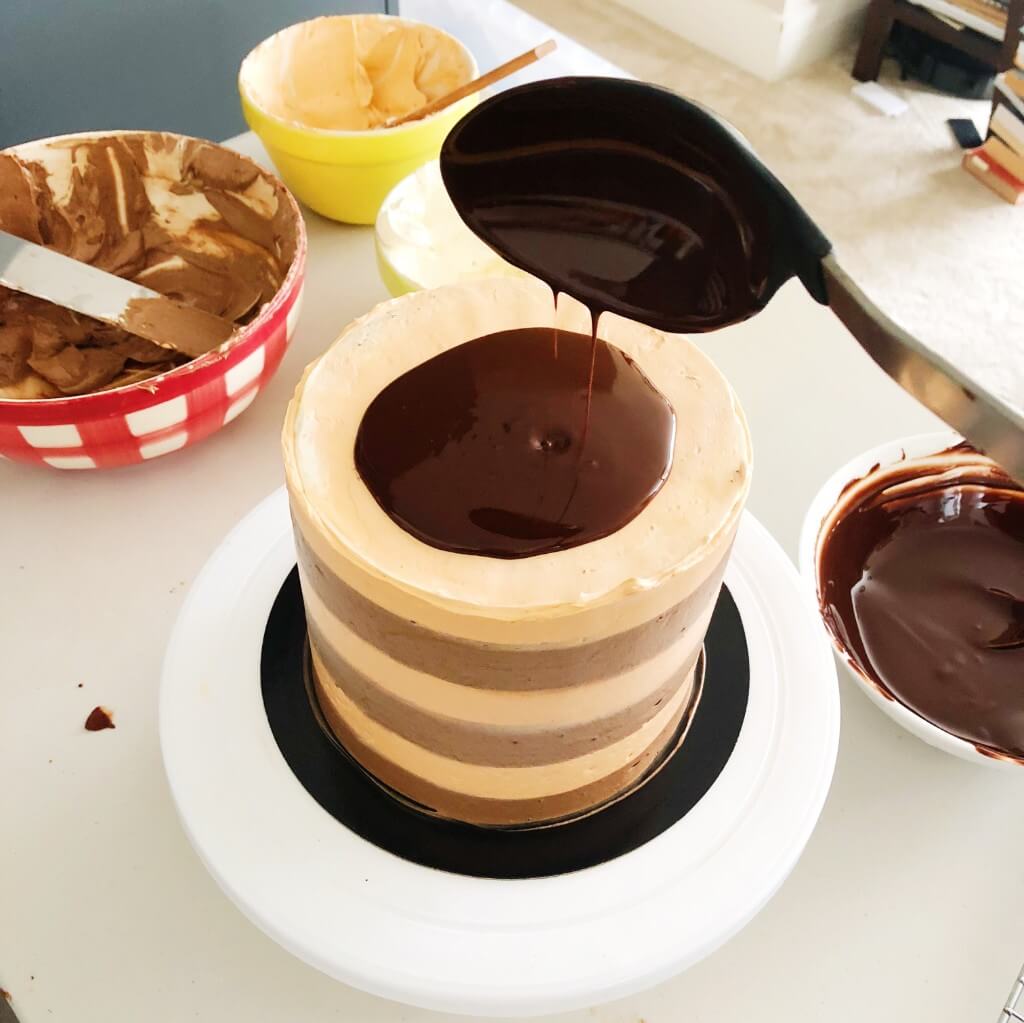 Chocolate Drip Cake Recipe - pour ladle of ganache