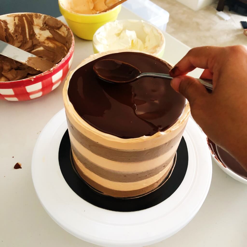 Chocolate Drip Cake Recipe - spread ganache to edge of cake