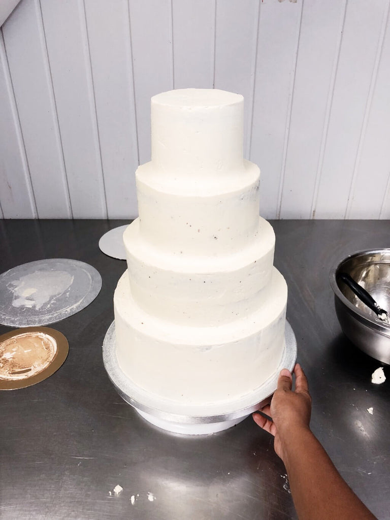 Perfectly stacked and smoothed tiered cake
