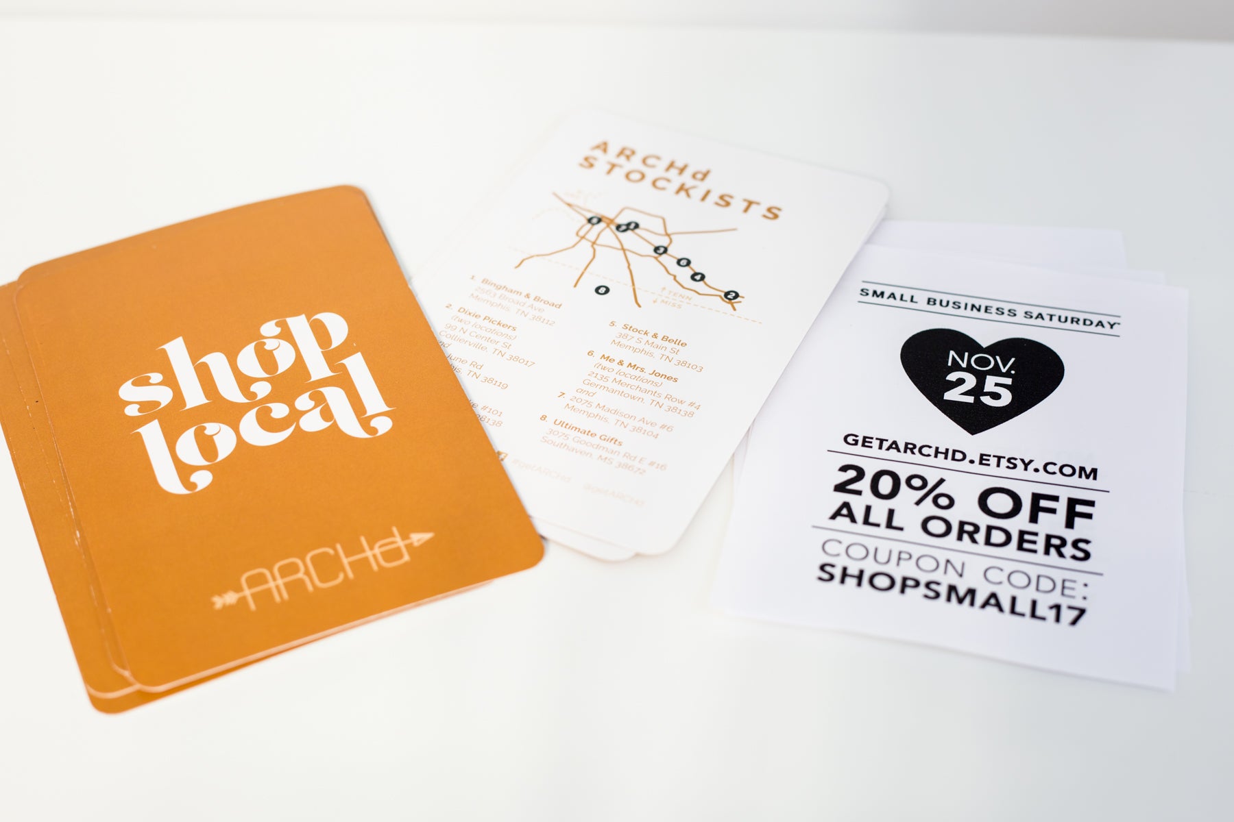 Vendor booth swag flyers design ideas where to shop local sign coupon branding ARCHd