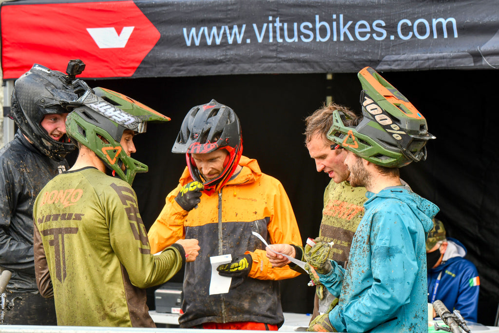 Riders at Vitus First Tracks Enduro Cup checking run times