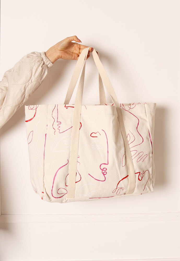 VILA Abstract Faces Canvas Tote Shopper Bag in Cream & Pink Tones - concretebartops