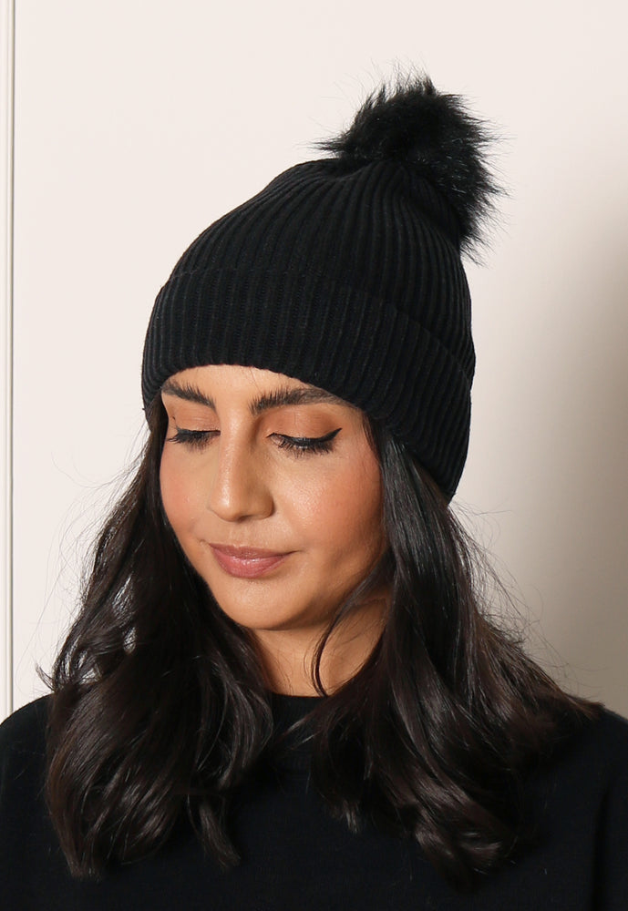 VERO MODA Lif Rib Knit Beanie Hat with Faux Fur Pom in Black - concretebartops