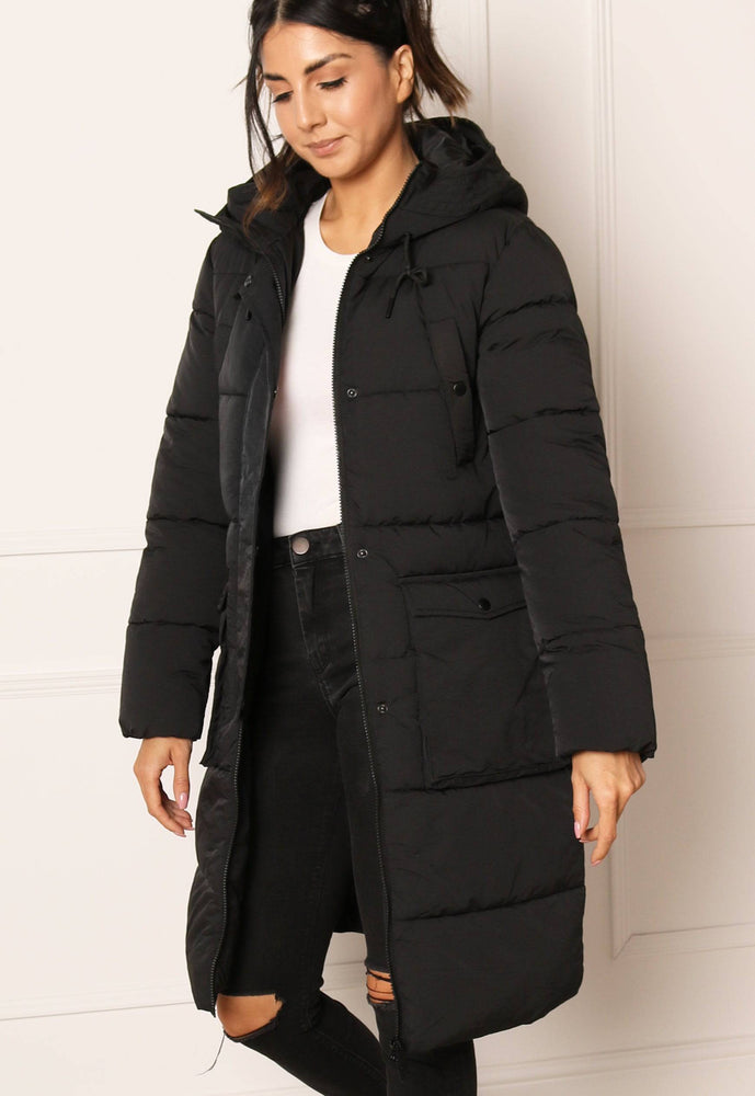 JDY Dove Quilted Longline Hooded Puffer Coat in Black - concretebartops