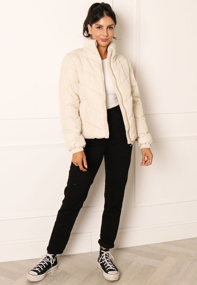 JDY Finno Short Padded Puffer Jacket in Cream - concretebartops