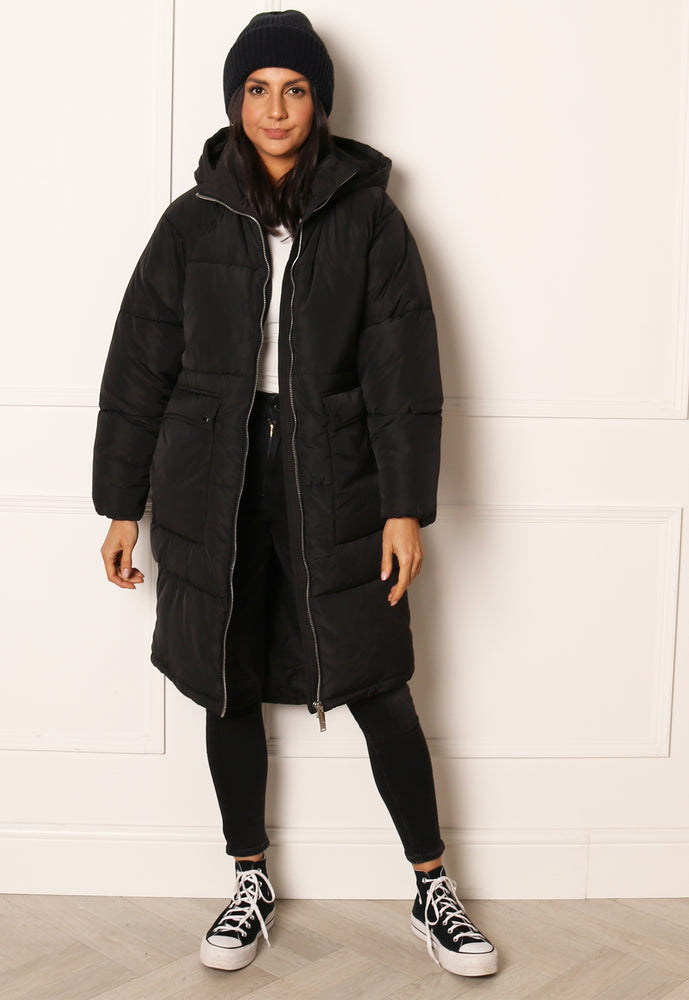 ONLY Gabi Oversized Longline Puffer Coat with Hood & Pockets in Black - concretebartops
