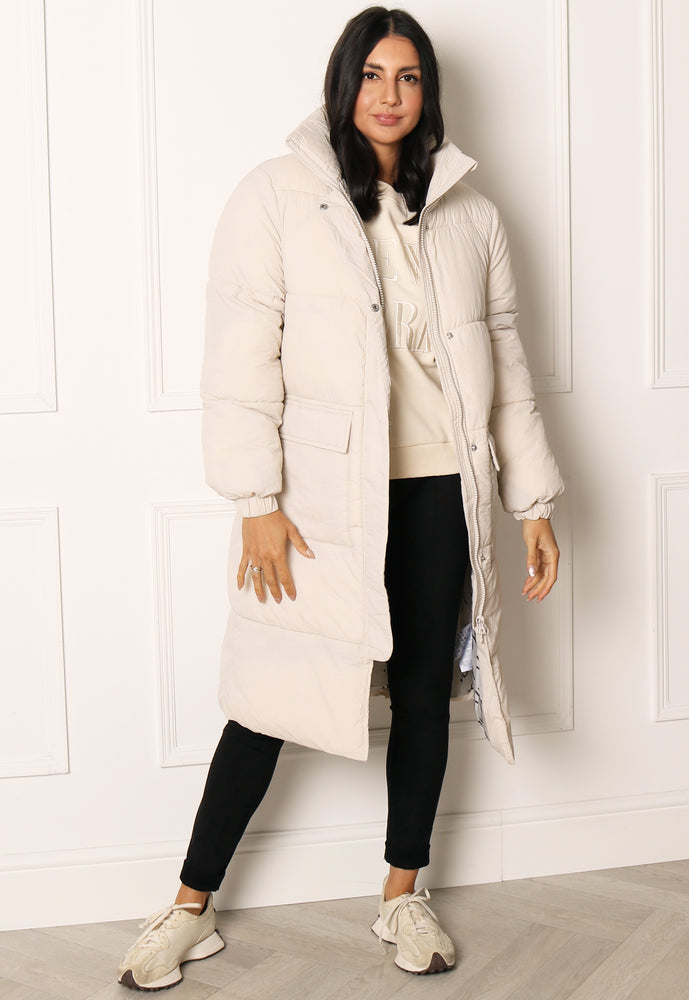 JDY Lenora Oversized Longline Puffer Coat with Pockets in Cream - concretebartops