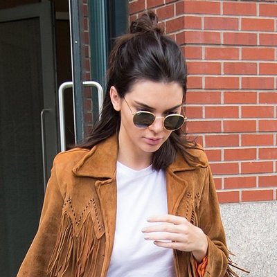 Brown haired Kendall Jenner wearing sunglasses
