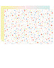 front and back of double-sided gift wrap in rainbow chip and rainbow gradient striped patterns