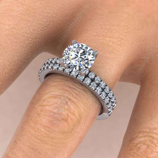 Dainty Classic Pave Bridal Set Featuring a Round Brilliant Center Diamond. This design features a Round Brilliant Center stone with a micro-prong set pave thin shank (approximately 1.6mm total width) and a matching wedding band.