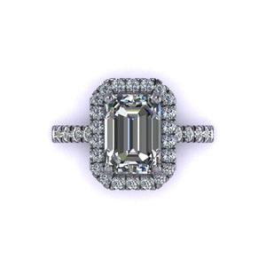 Classic Emerald Cut Halo Setting with Tulip Cathedral Profile Elegant Emerald Cut halo with a clean and modern look Cathedral profile made to sit a wedding band flush Designed with perfect proportions of from shank to halo creating a beautiful design aesthetic Designed with tensile strength in mind while maintaining delicate and seamless look. Made with about 20-25% more metal to ensure structural integrity