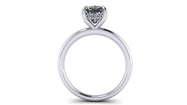 Cushion-Cut Center Stone with Diamond Hidden Halo Engagement Setting  This ring features a square cushion brilliant center stone set in an all-around comfort fit rounded solitaire shank with a diamond basket that elegantly cradles the center stone.