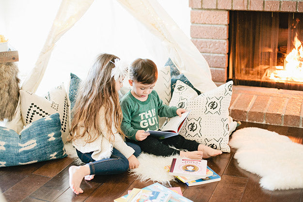 Cozy play date for littles with teepee and fireplace