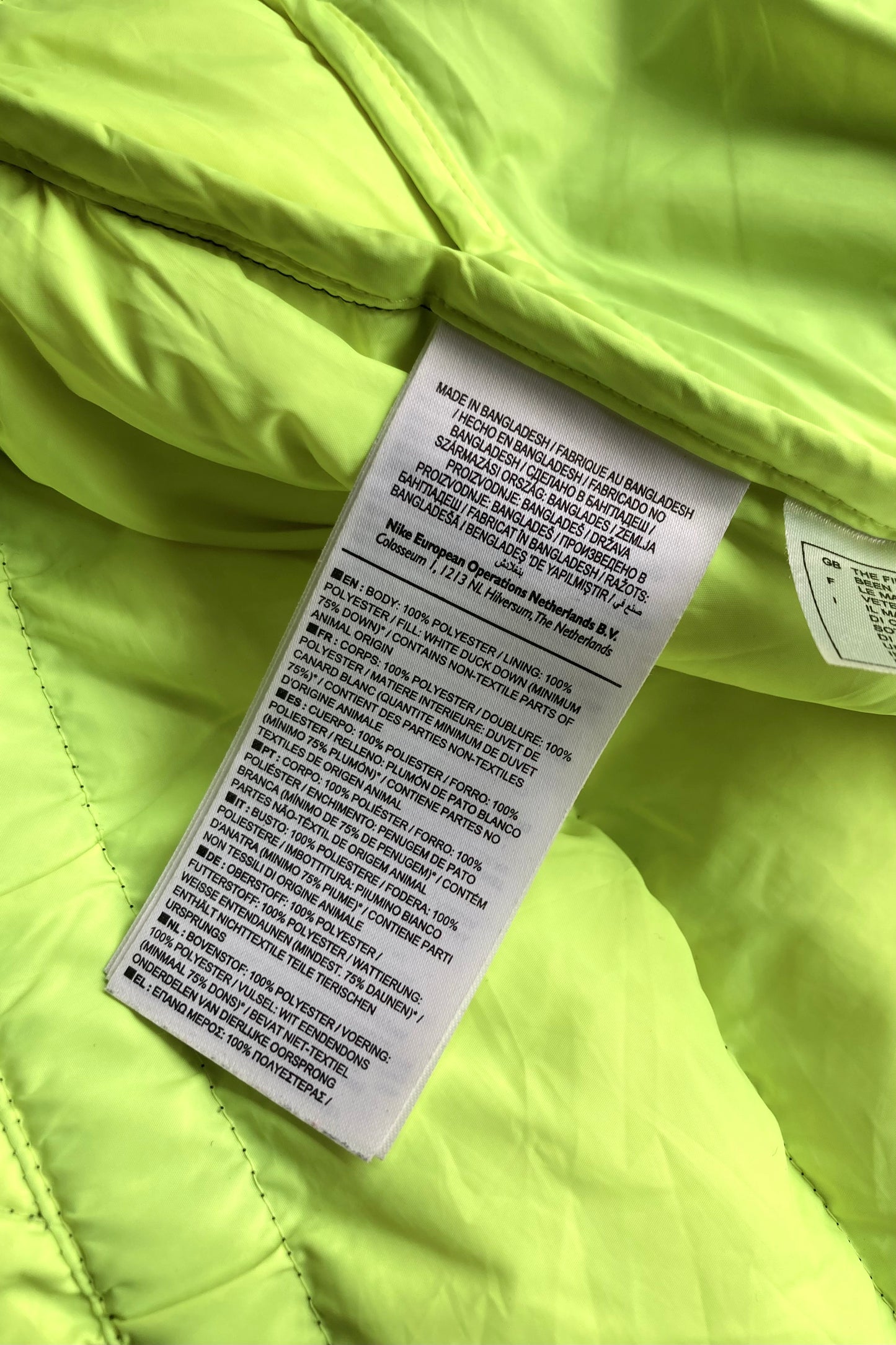 Nike rövid karcsúsított sötét kékesszürke tolldzseki (34/36, Toll)